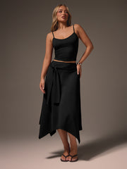 TANK TOP WITH ASYMMETRIC MIDI WRAP SKIRT WITH TIE WAIST DETAIL