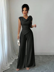 PEPLUM ROUND NECK TOP ASYMMETRICAL HEM AND LONG PANTS