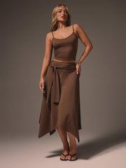 TANK TOP WITH ASYMMETRIC MIDI WRAP SKIRT WITH TIE WAIST DETAIL